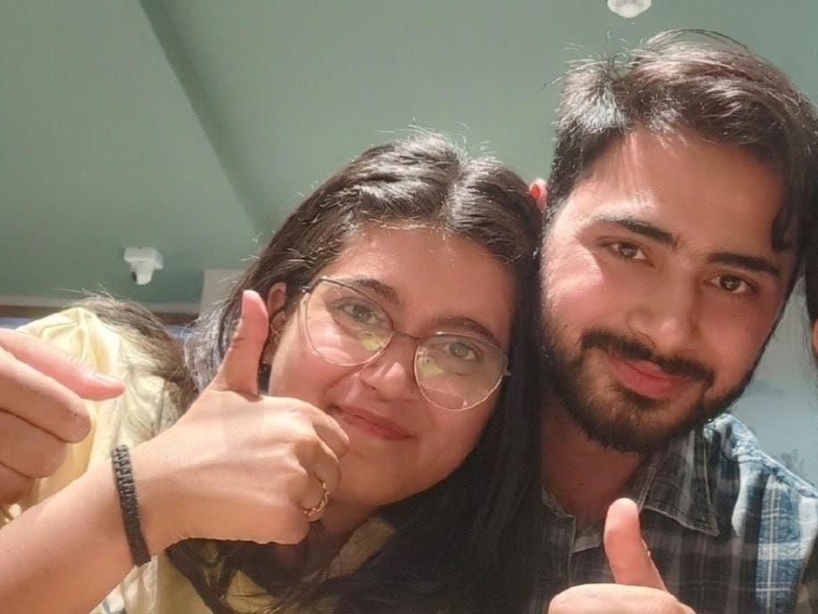 Us — thumbs up